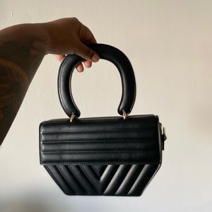 Black crossbody with gold hardware